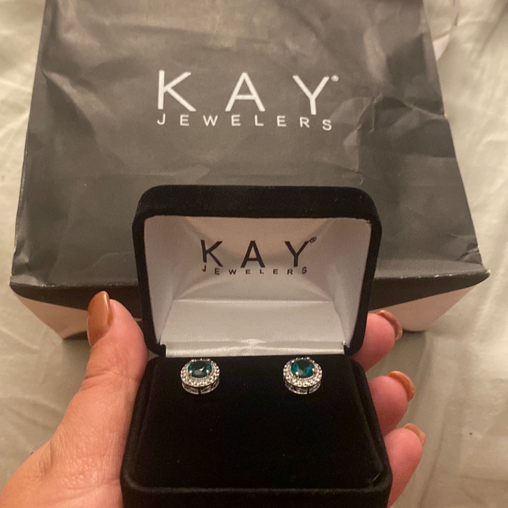 Kay Jewelers emerald birth stone earrings never worn brand new.